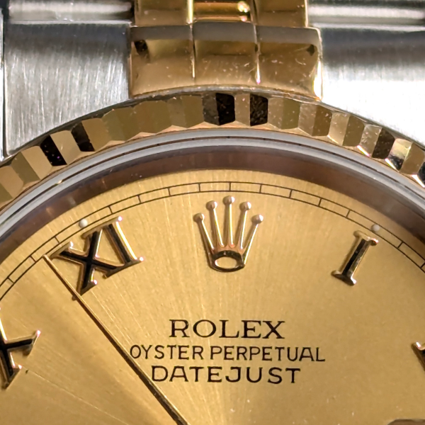 Champagne roman dial Rolex DateJust  clasp