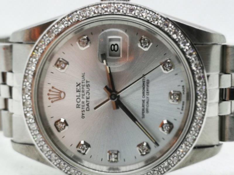 Steel Datejust benefiting from aftermarket upgrades to bezel and dial clasp