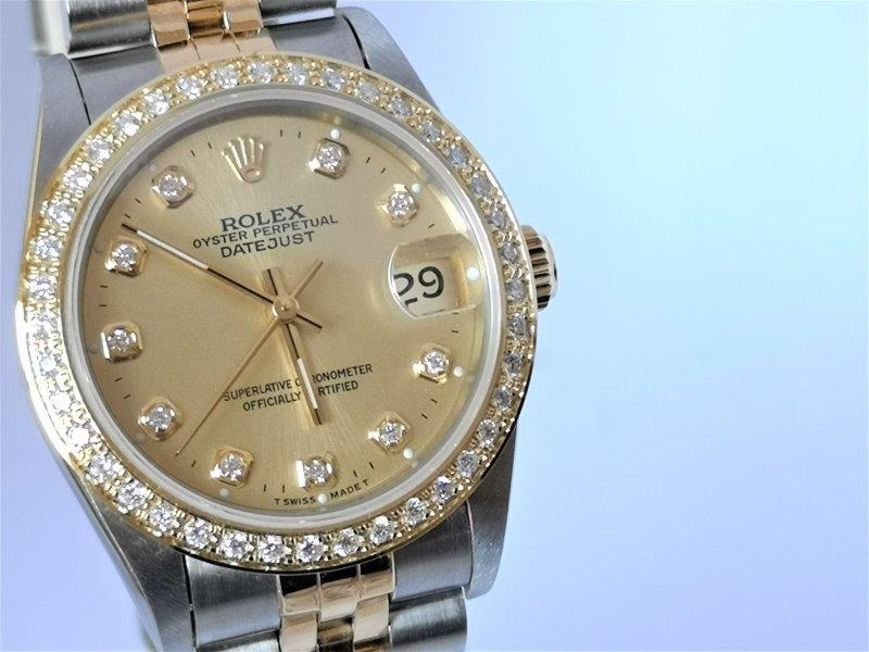 Rolex DateJust midi with Diamonds front