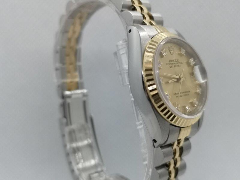 Rolex Datejust with Champagne and original diamond dot dial dial