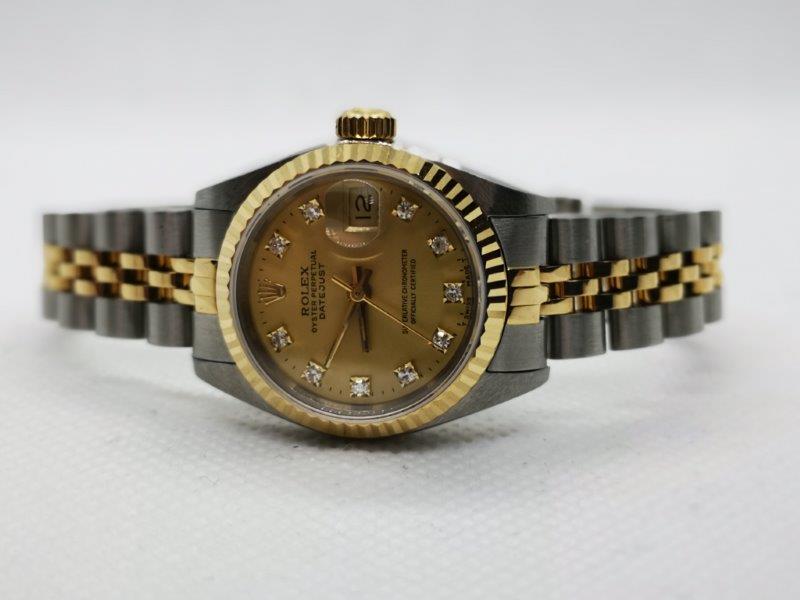 Rolex Datejust with Champagne and original diamond dot dial side