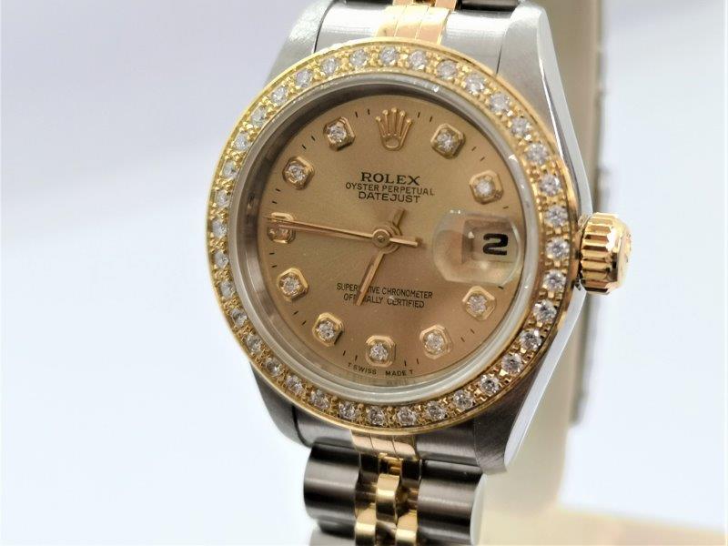 Rolex rolling in diamonds dial
