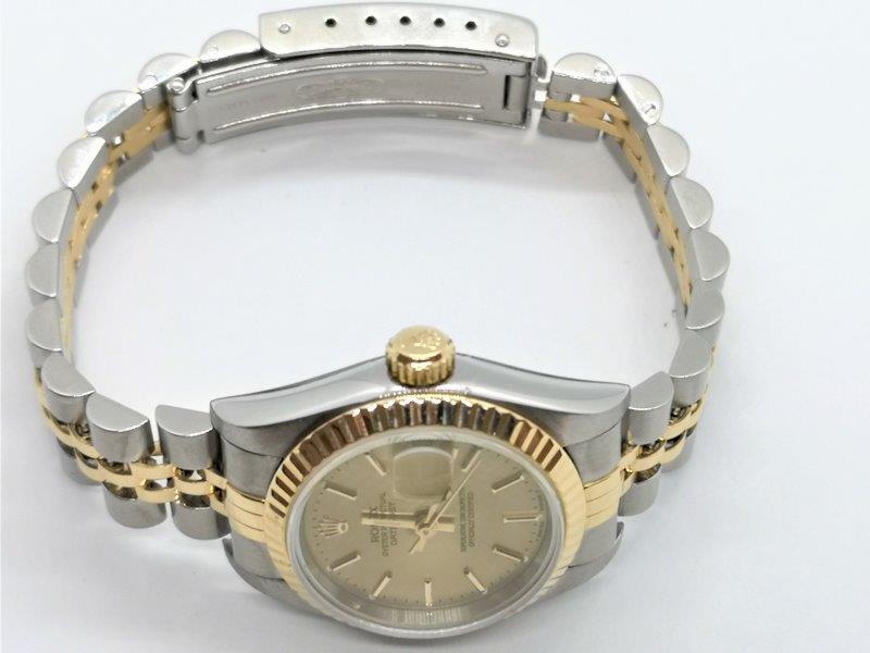 Rolex DateJust with Champagne Dial crown