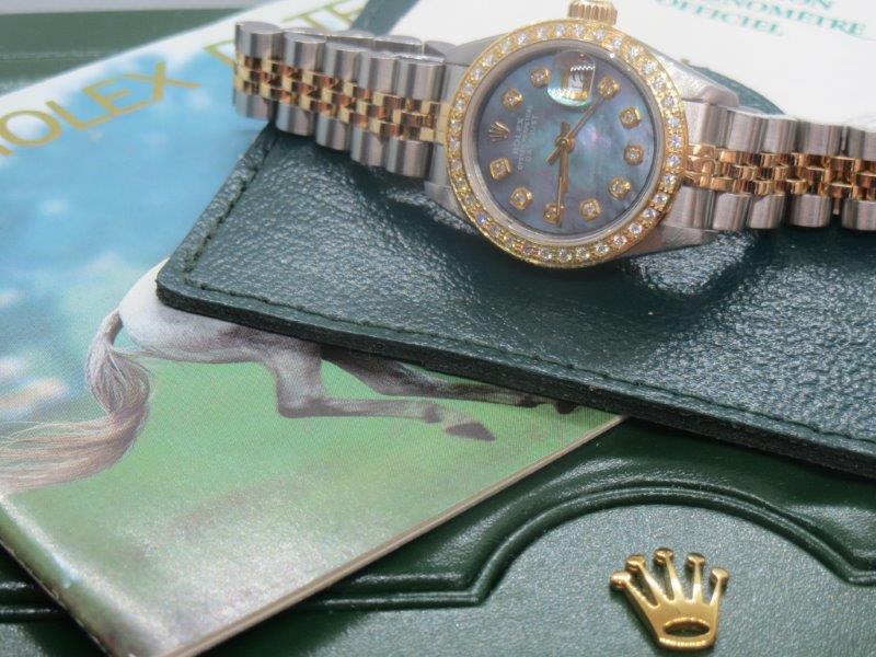 This beautiful Rolex Datejust features Diamonds and Mother of Pearl front