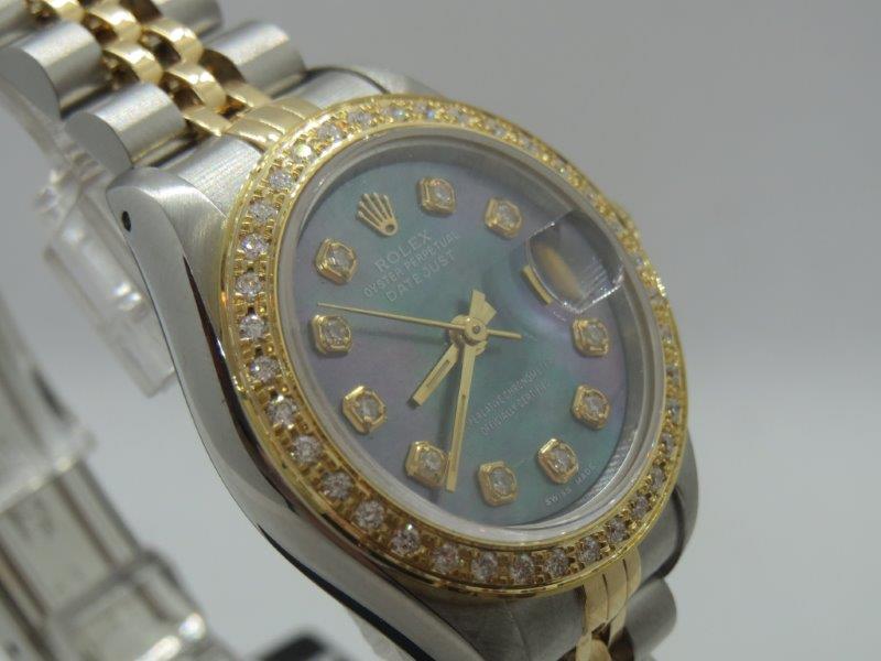 This beautiful Rolex Datejust features Diamonds and Mother of Pearl side