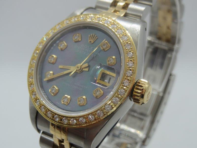 This beautiful Rolex Datejust features Diamonds and Mother of Pearl crown