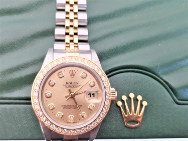 Ladies Rolex with diamonds dial