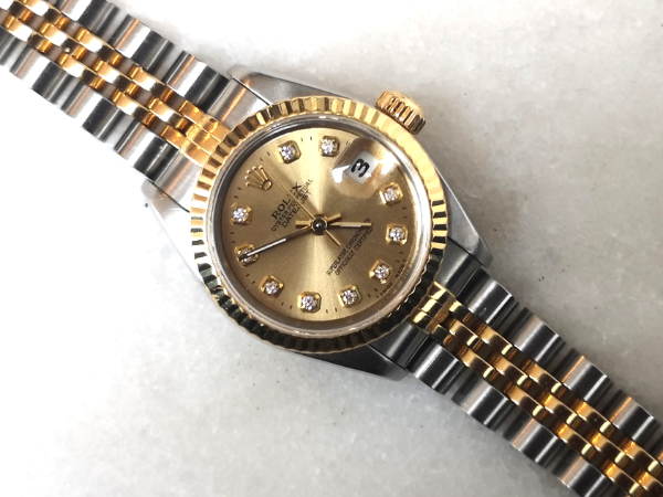 Rolex with diamond dial