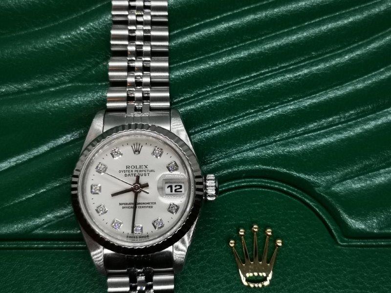 With original diamond dot dial this Rolex really dazzles front